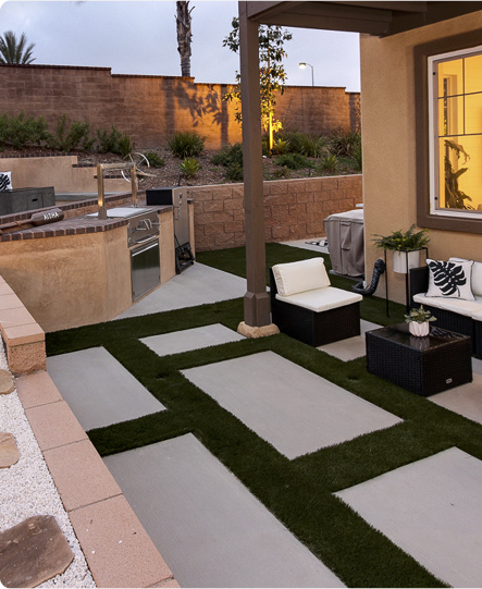 concrete and turf design backyard
