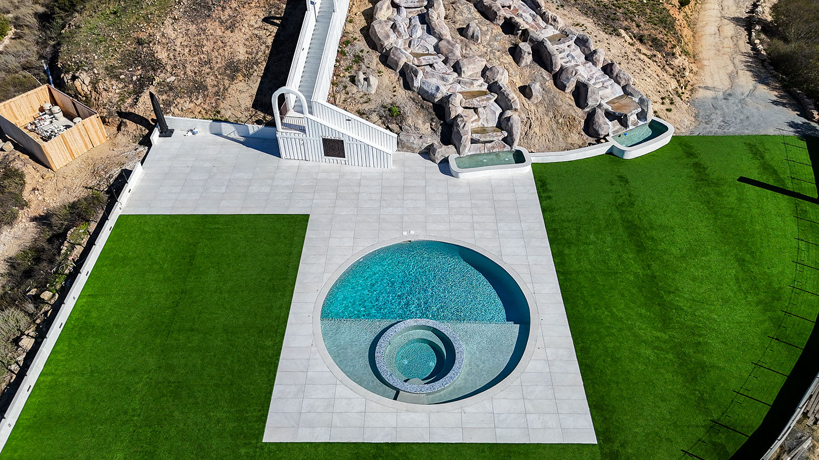 Artificial turf with pool and pavers in Fallbrook