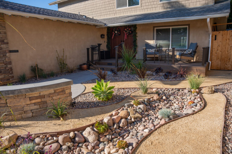 Modern patio with retaining walls and low-maintenance landscaping